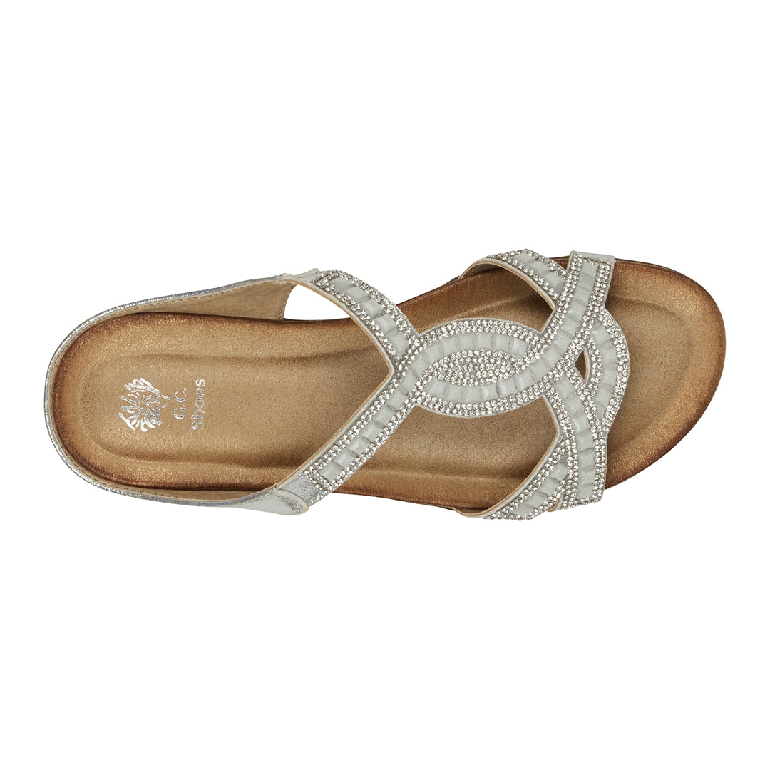 Silver sandal with embellishments on a white background