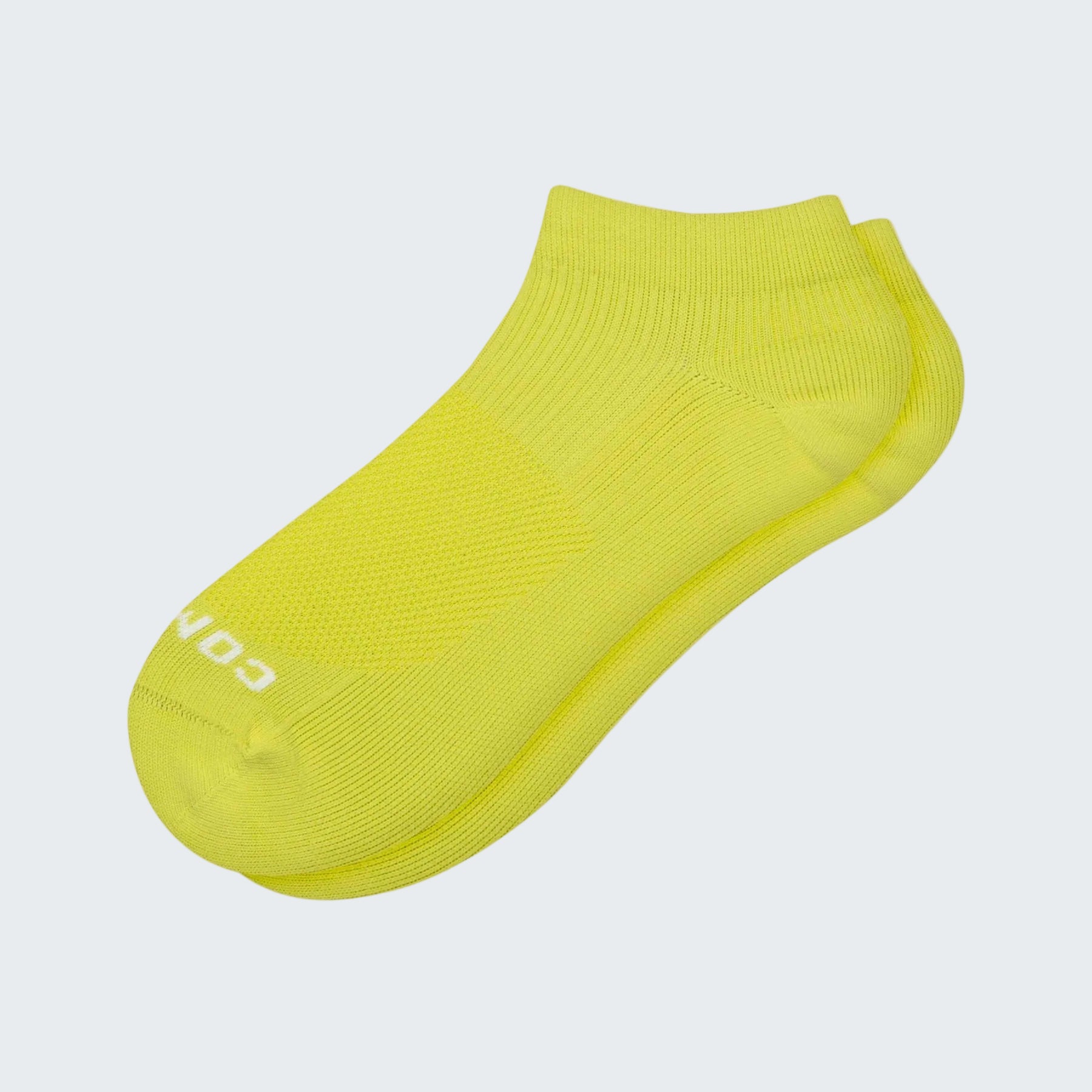 Yellow ankle sock on a white background