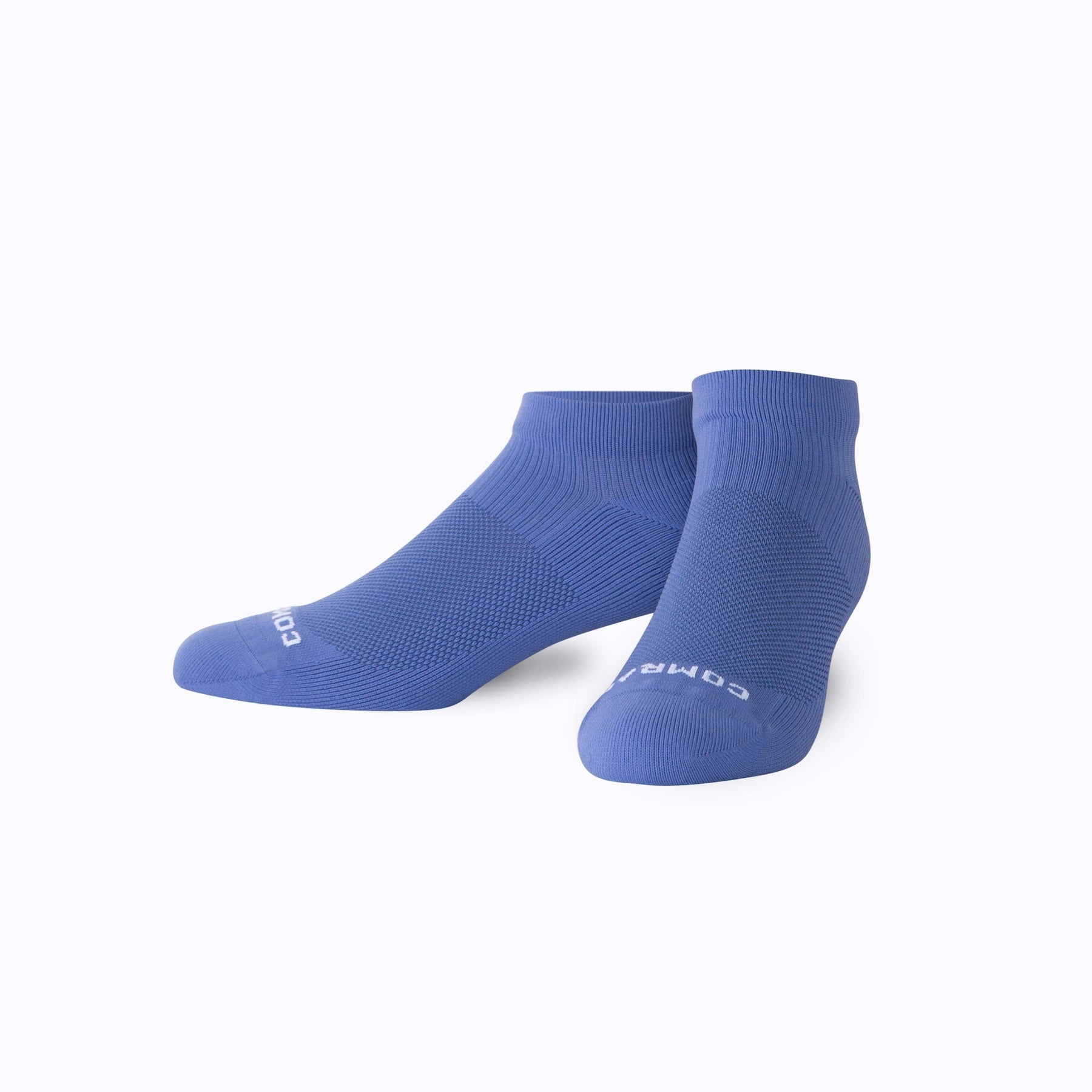 Pair of blue socks on a white background