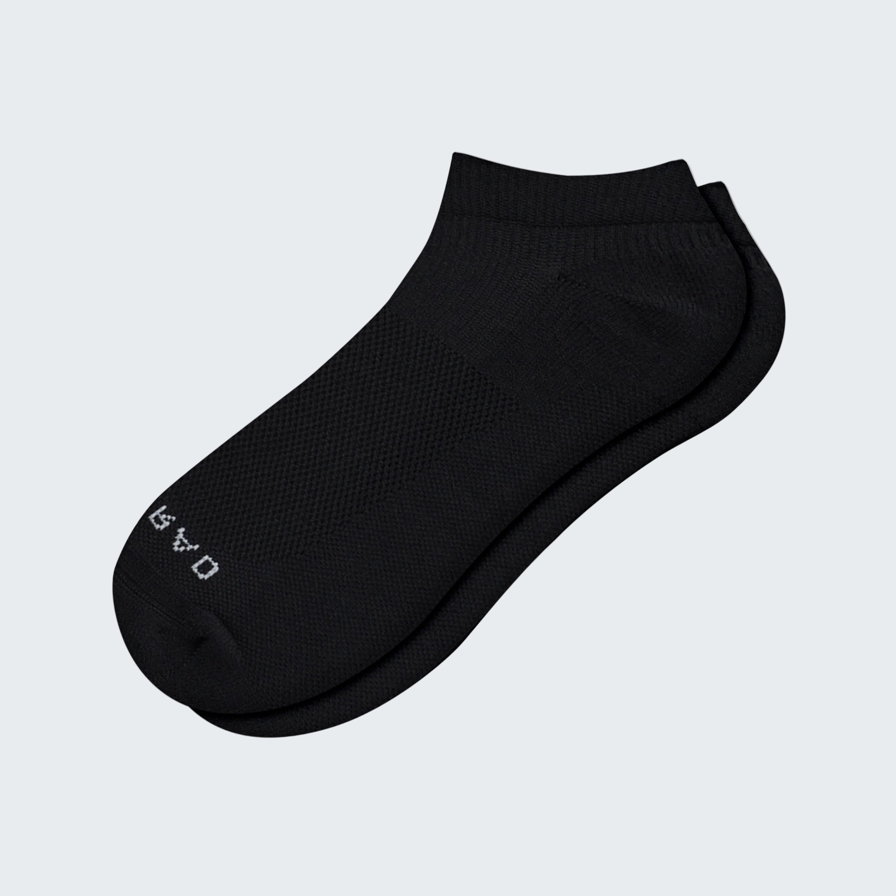 Black ankle sock on a white background
