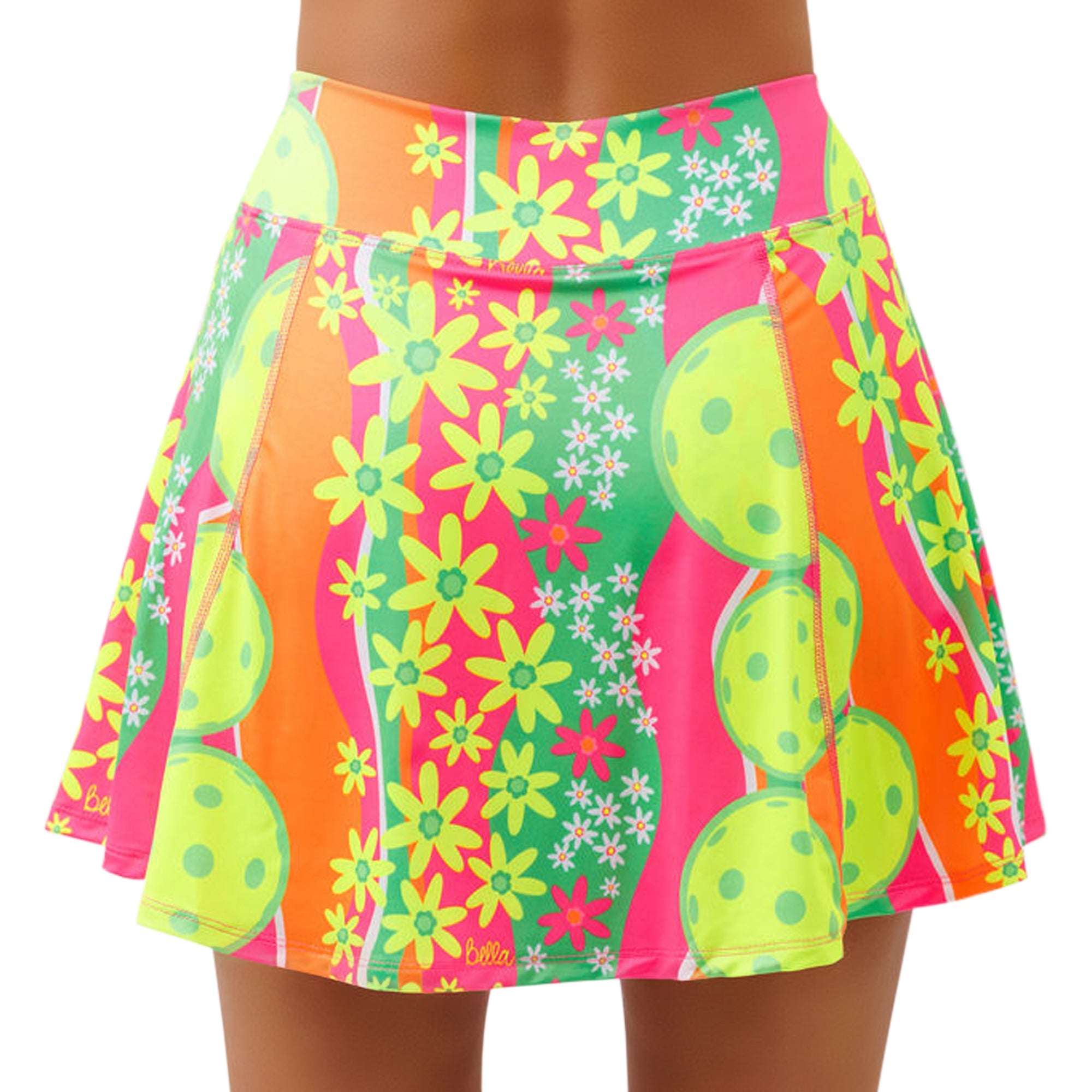 Colorful skirt with floral and tennis ball pattern on a white background