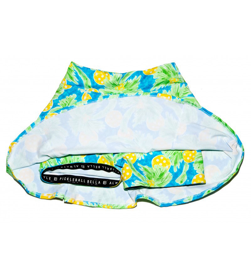 Reusable diaper with pineapple and floral pattern on a white background