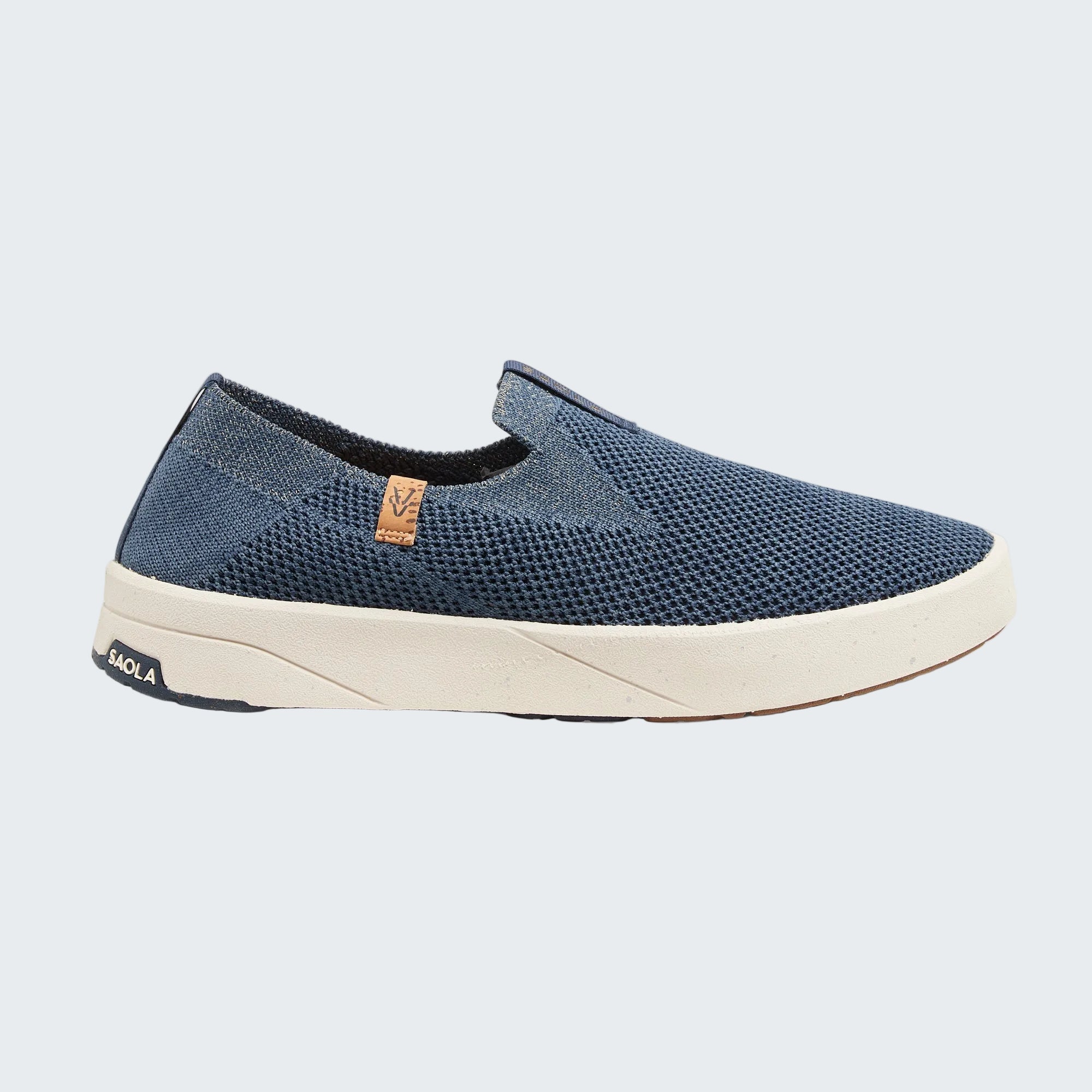 A single slip-on sneaker in blue mesh fabric with a thick cream-colored sole, shown from the side against a light gray background. The brand name 'FACL' is visible on the heel of the sole.