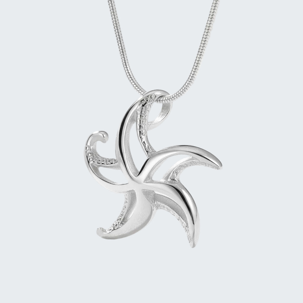 Silver pendant necklace on a white background