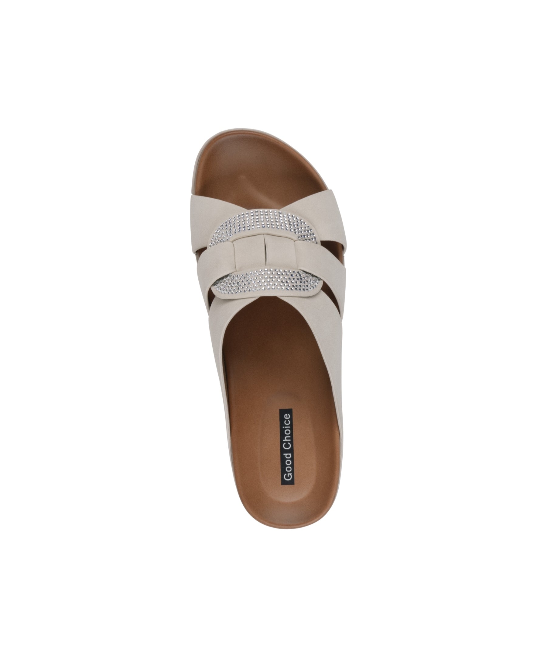 White sandal with brown sole on a white background