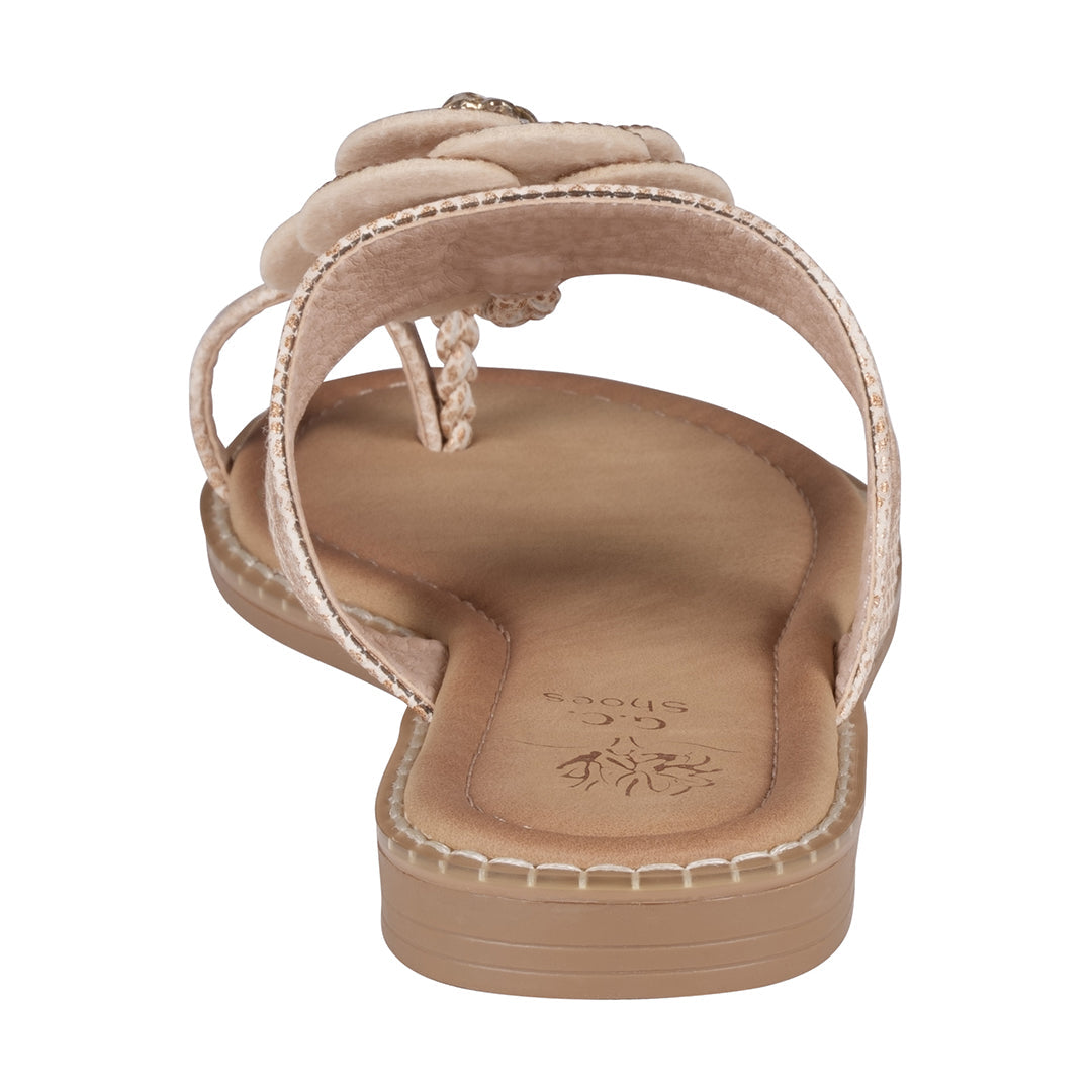 Beige sandal with braided design on a white background