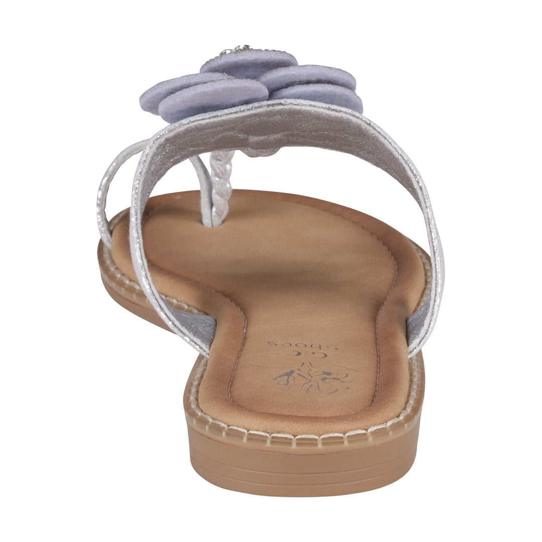 Flip-flop sandal with a floral design on a white background