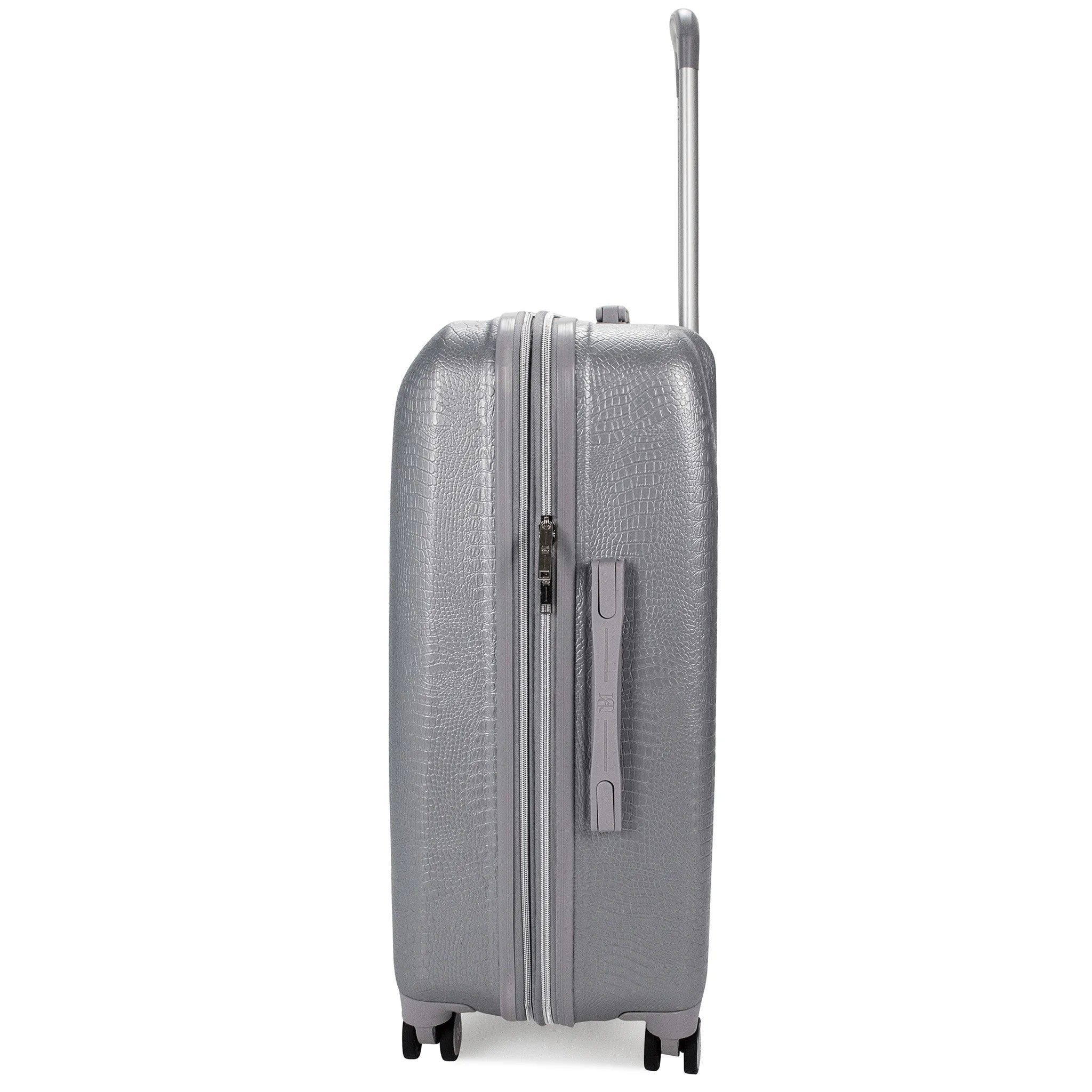 Silver suitcase with textured surface on a white background