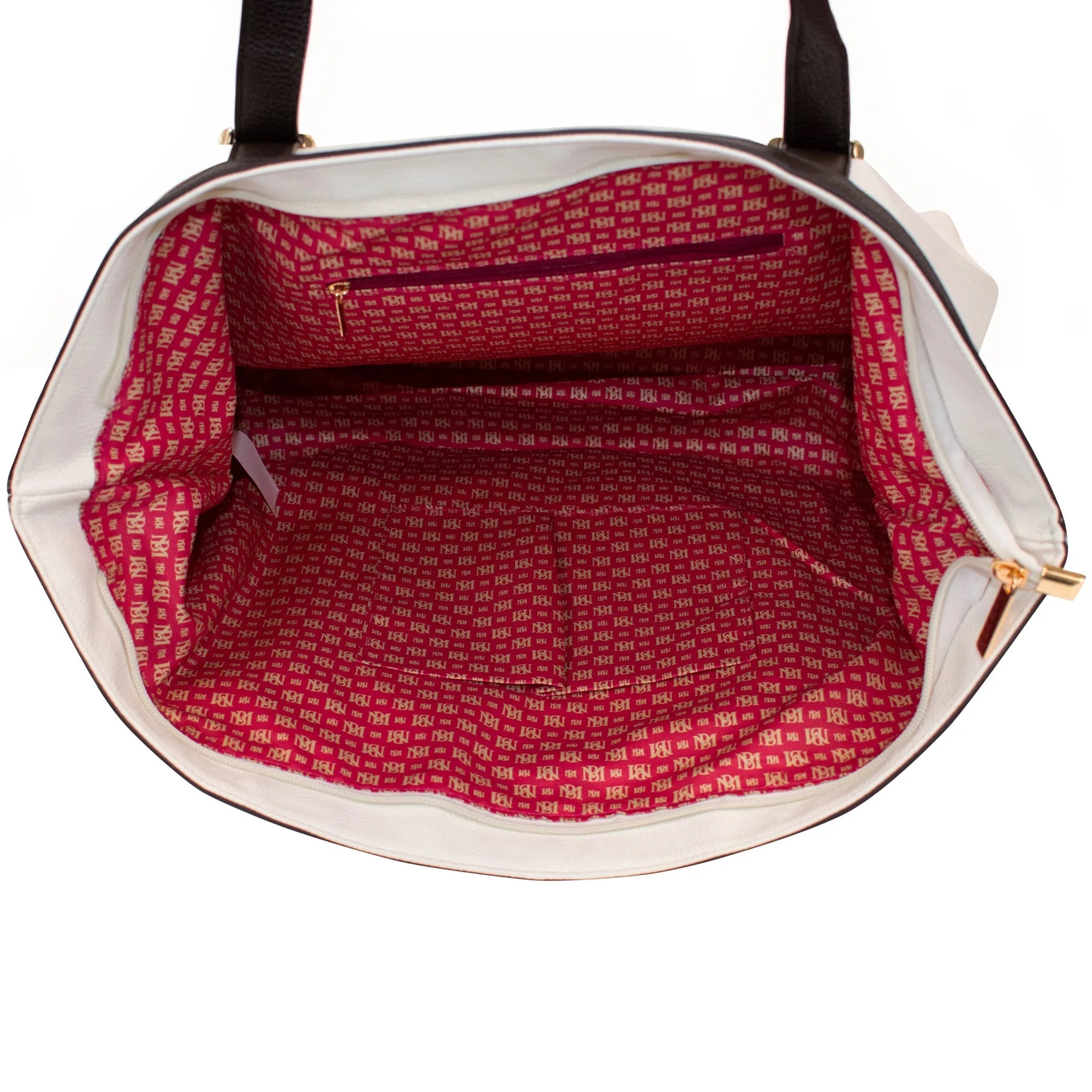 Close-up of a handbag with a red interior pattern on a white background