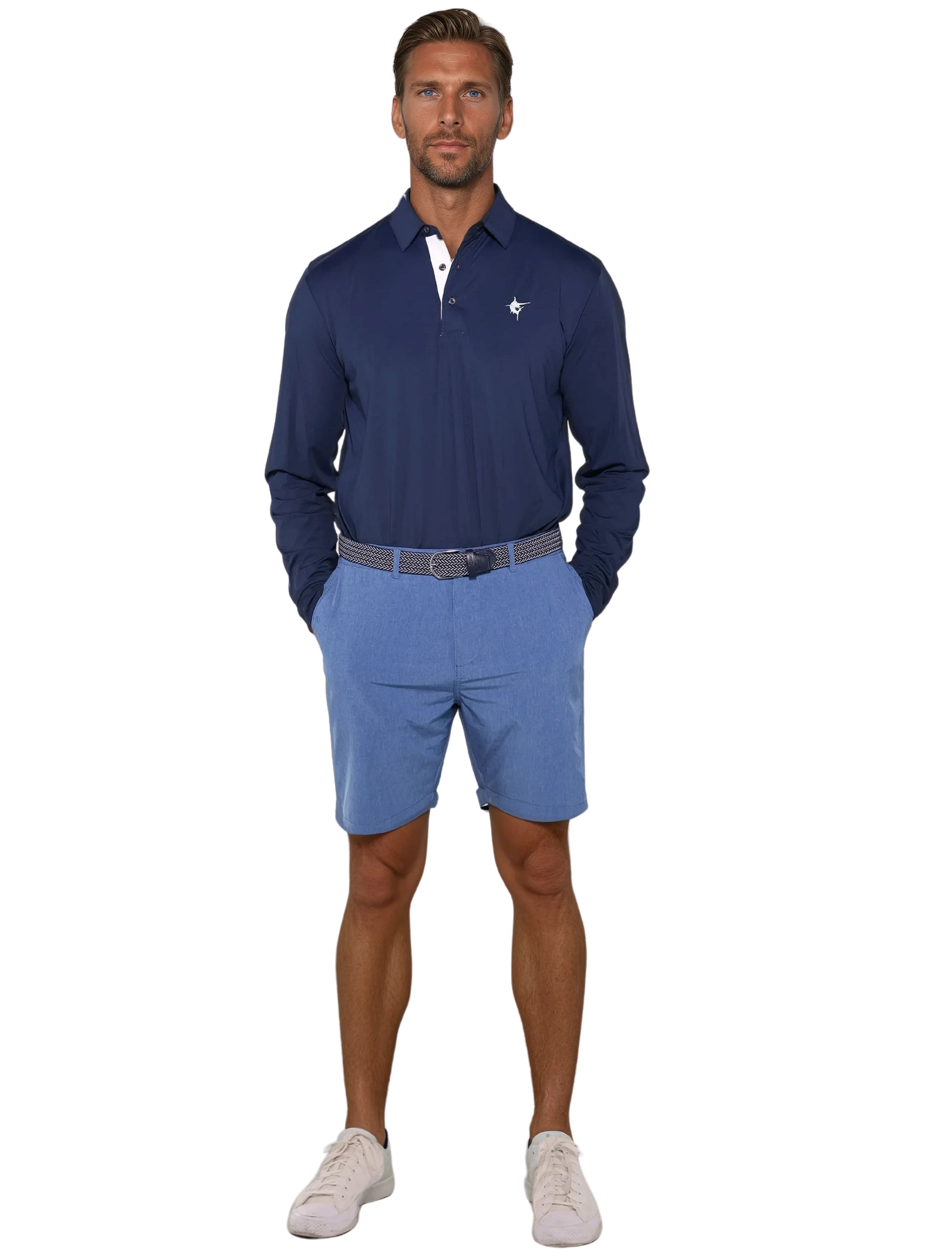 Man wearing a navy blue polo shirt and shorts on a white background