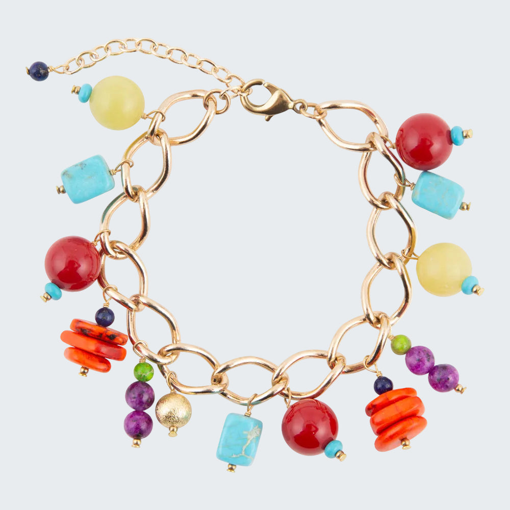 A gold-tone chain link bracelet with colorful dangling charms, including turquoise, red, yellow, orange, purple, and blue beads, shown on a plain white background.
