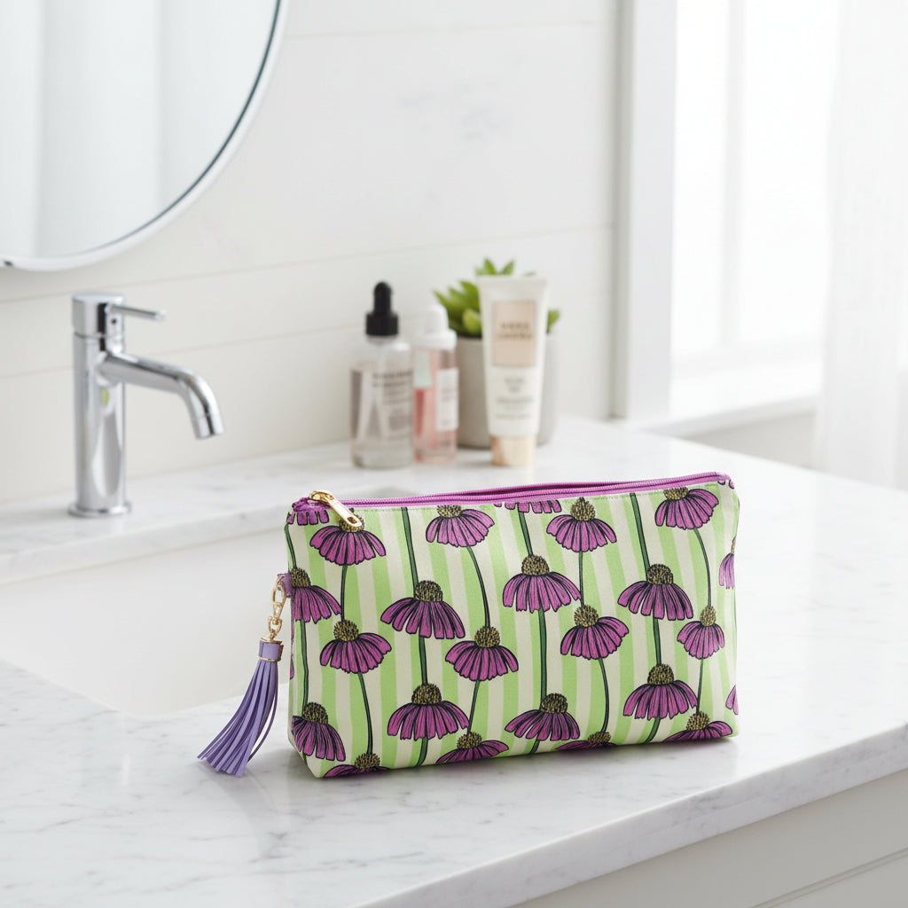 Clutch bag with purple flower pattern on a green background