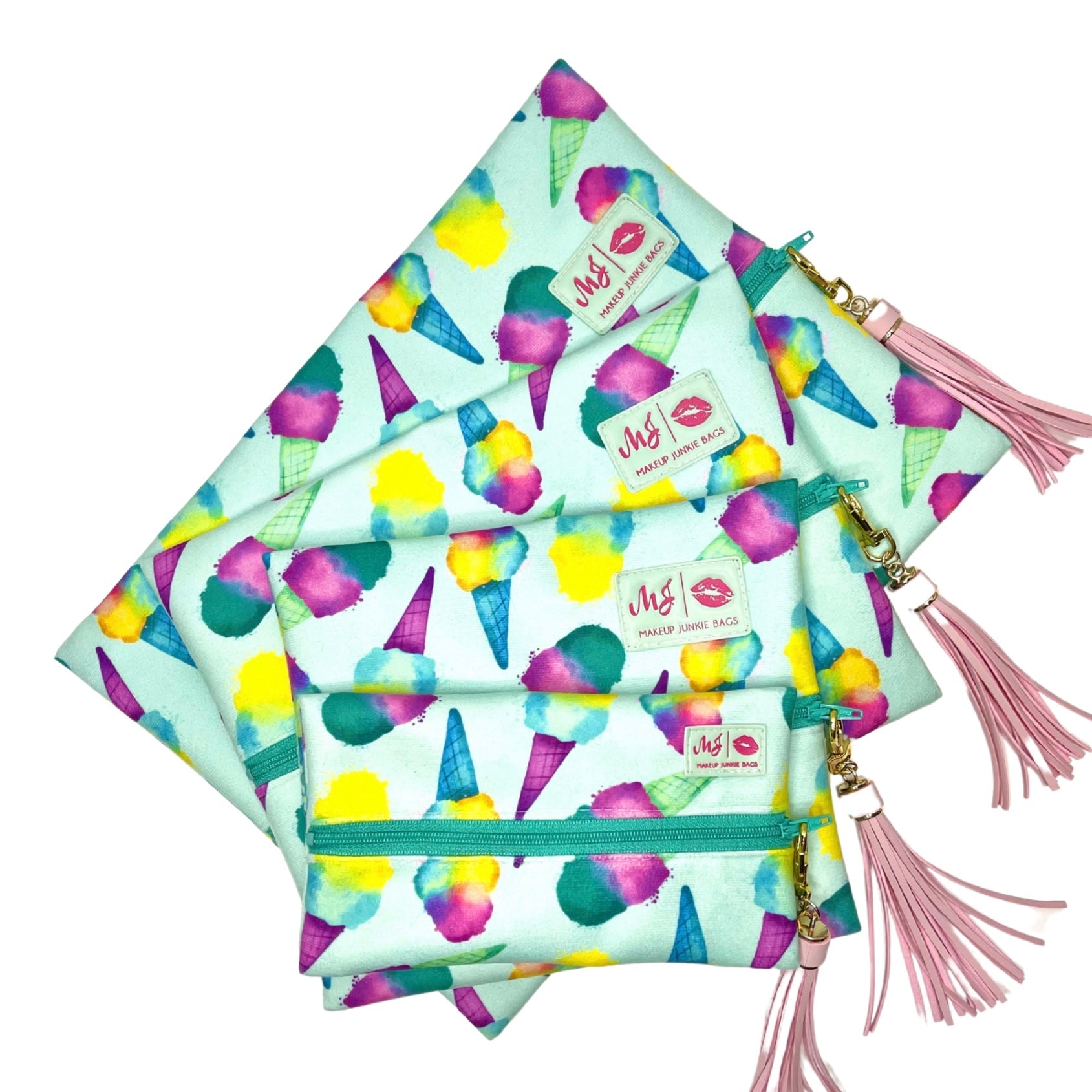 Set of colorful pouches with ice cream cone pattern and pink tassels on a white background
