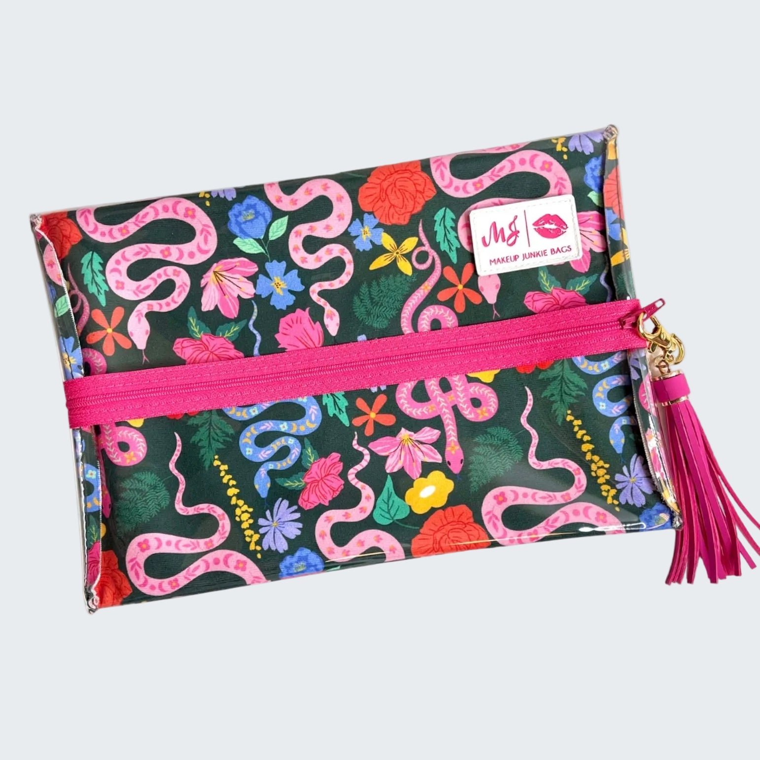 Makeup bag with snake and floral pattern, pink zipper, and tassel on a white background