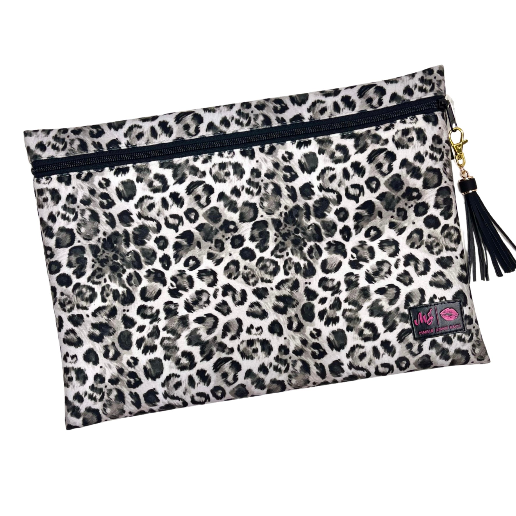 Leopard print pouch with a black zipper and tassel on a white background
