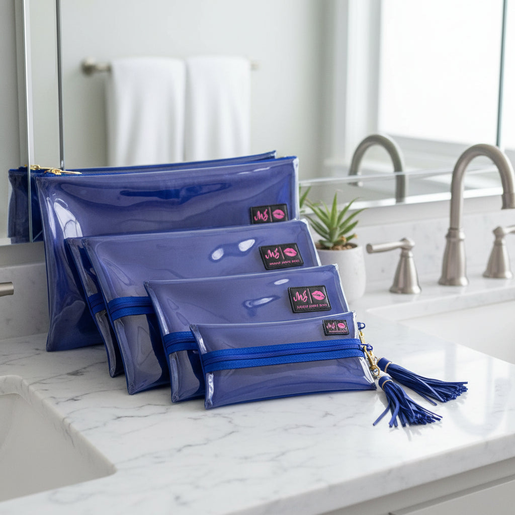 Set of blue pouches with tassels and visible brand logo on a white background