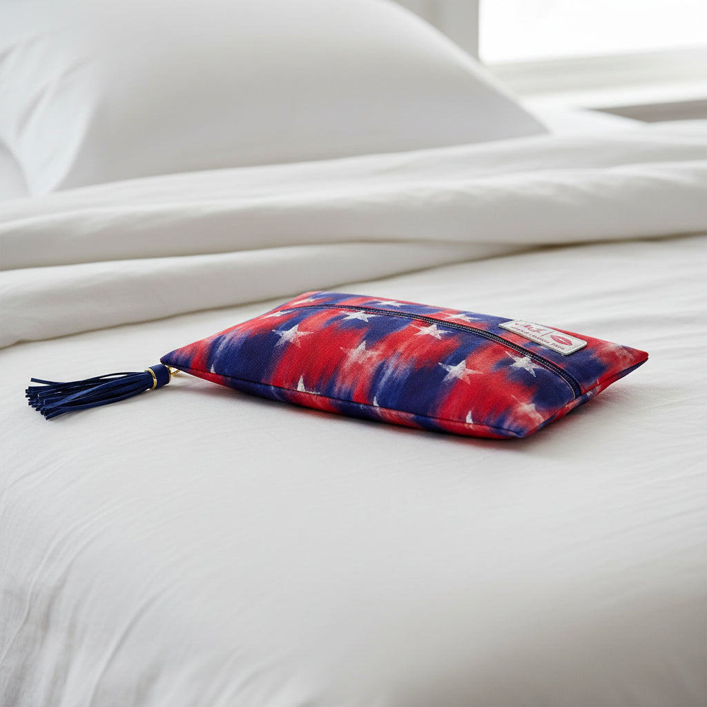 Pouch with American flag design and visible brand logo on a white background