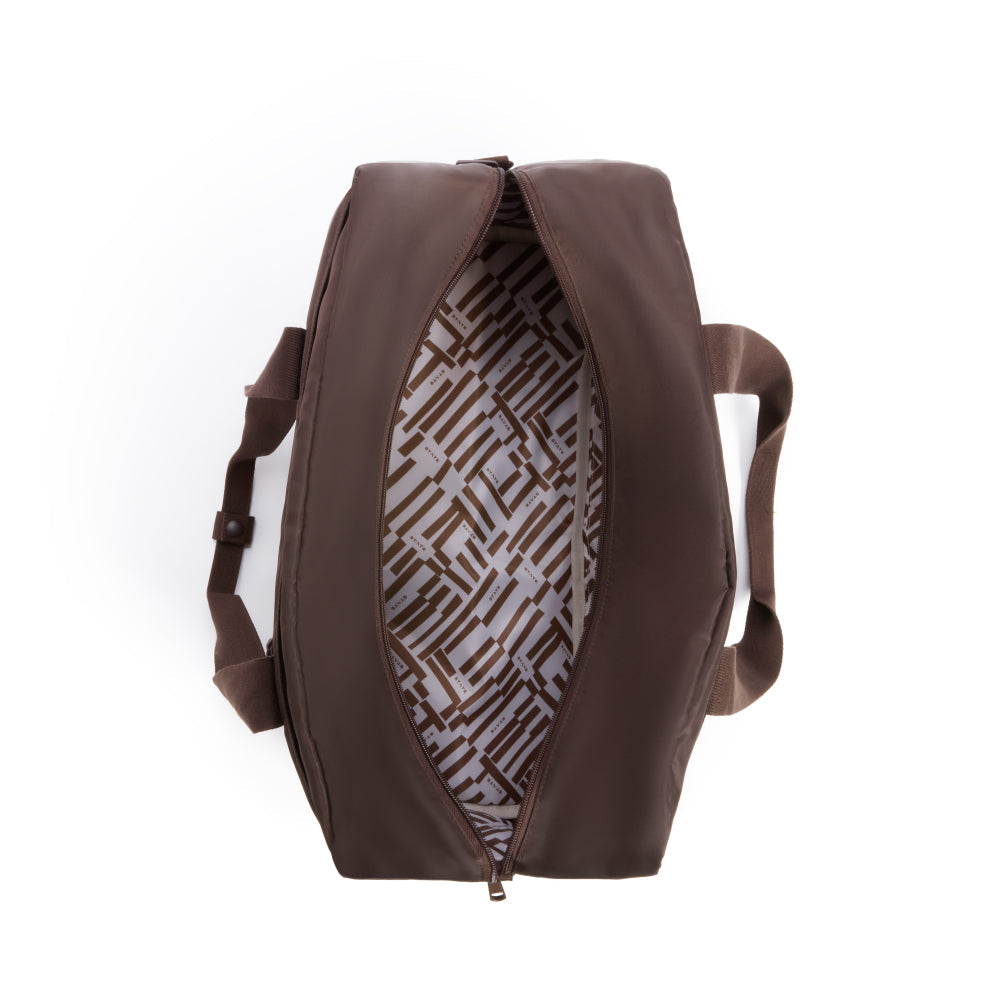 Brown backpack with geometric patterned interior on a white background