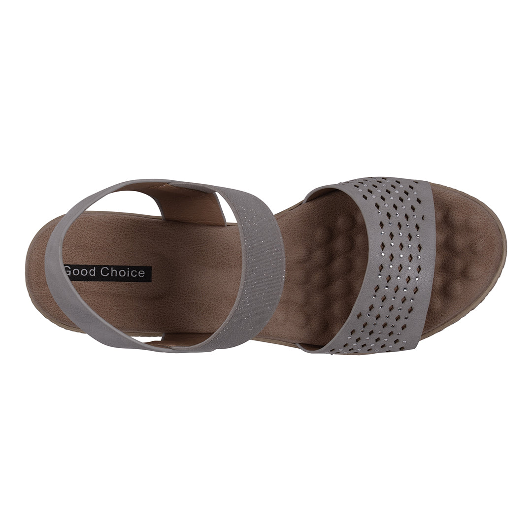 Brown sandal with gray straps on a white background