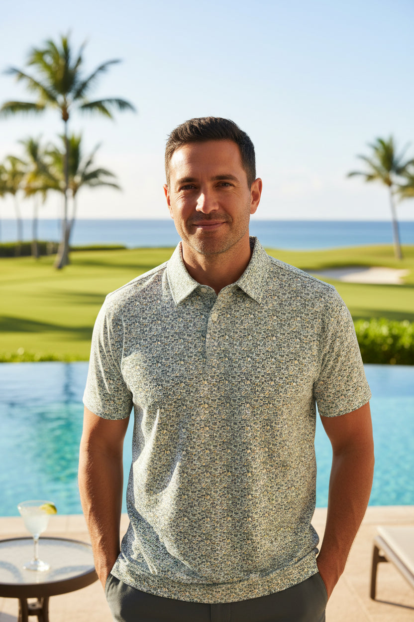 Green patterned shirt with a brand logo on a light blue background