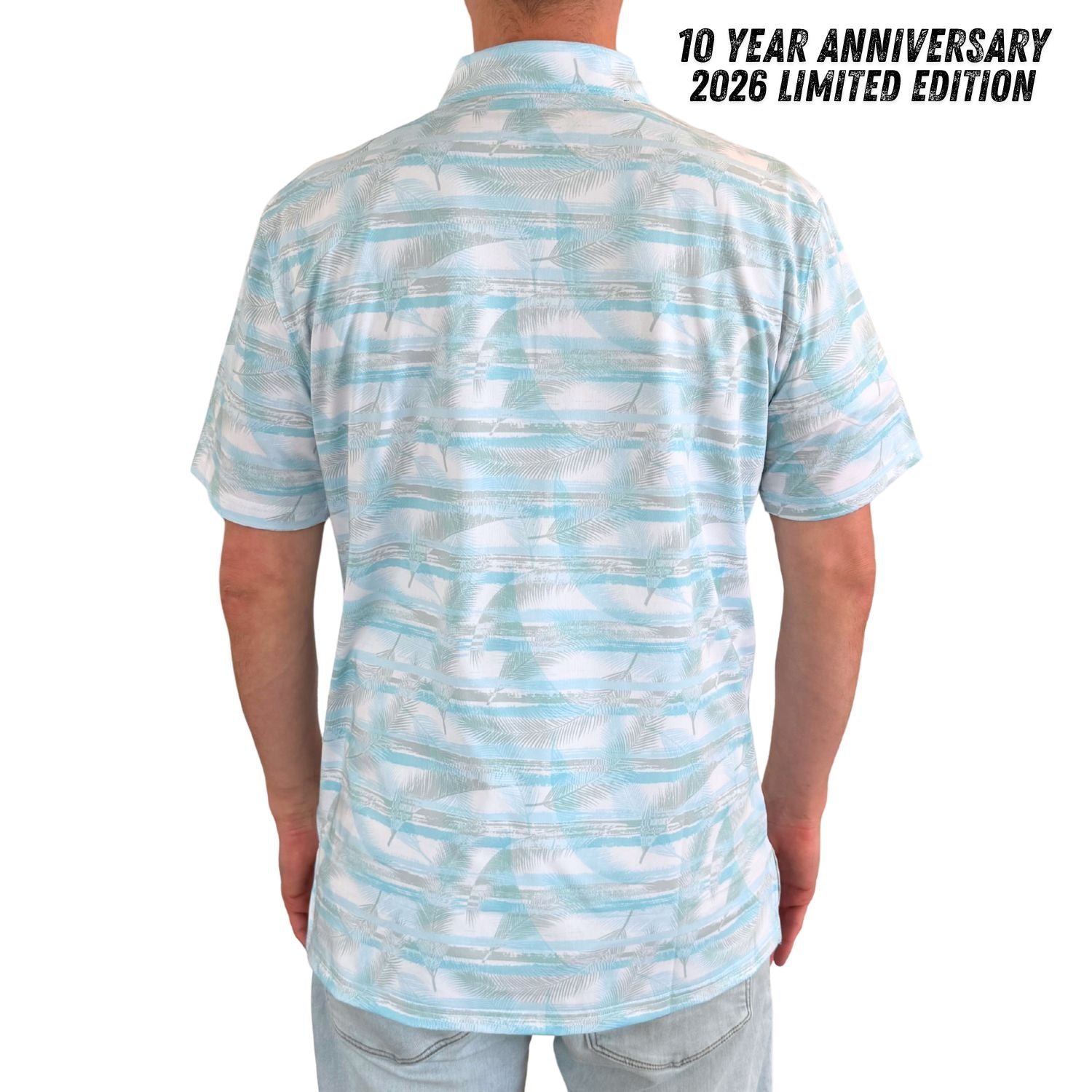 Person wearing a blue and white patterned shirt with '10 Year Anniversary 2026 Limited Edition' text.