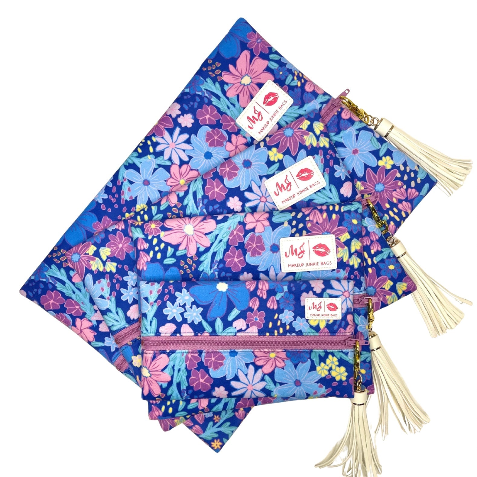 Set of floral pouches with tassels on a white background