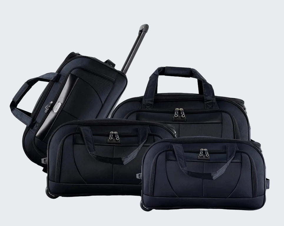 Set of black suitcases of different sizes on a white background