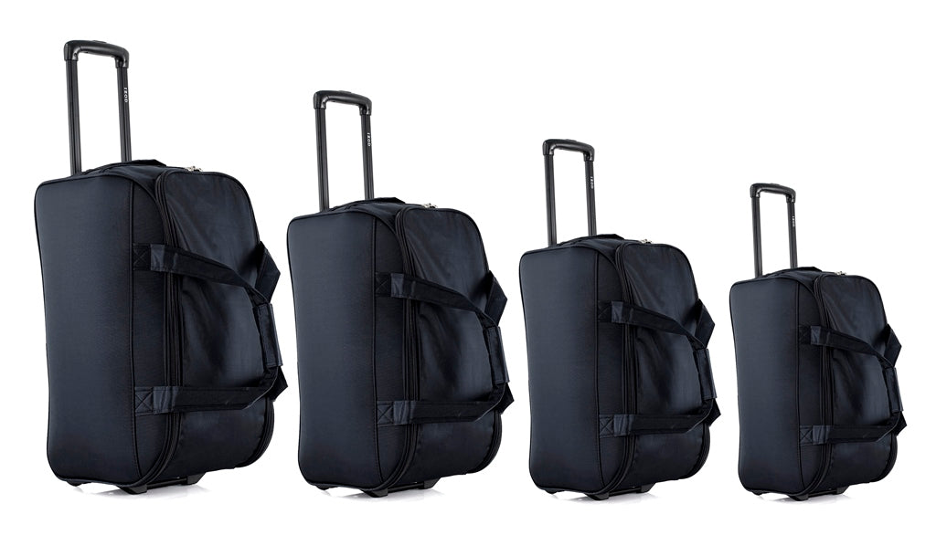 Four black suitcases of different sizes on a white background