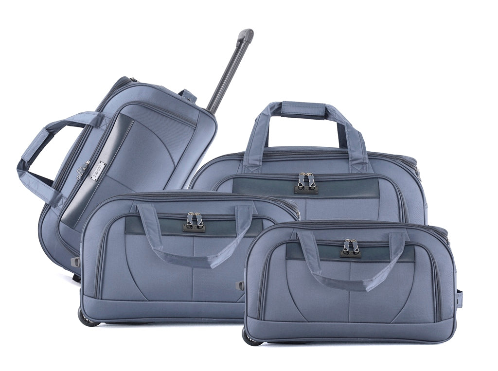 Set of gray suitcases with handles and wheels on a white background
