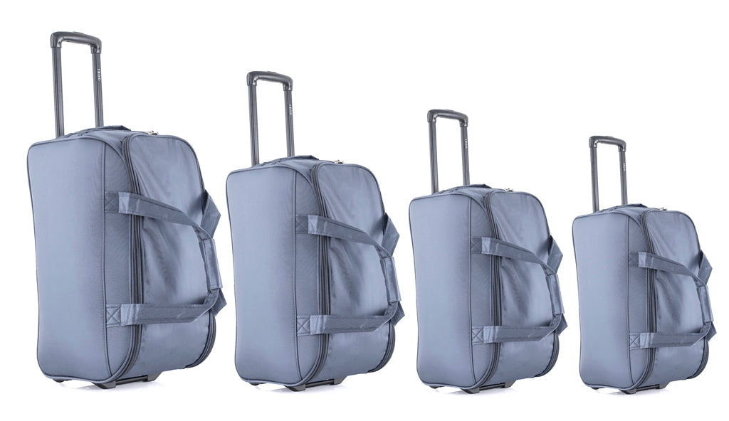 Four gray suitcases of different sizes on a white background