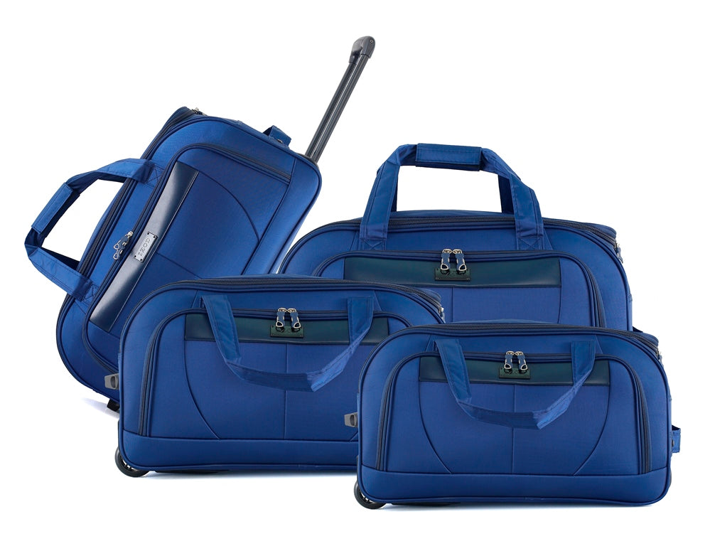 Set of blue suitcases of different sizes on a white background