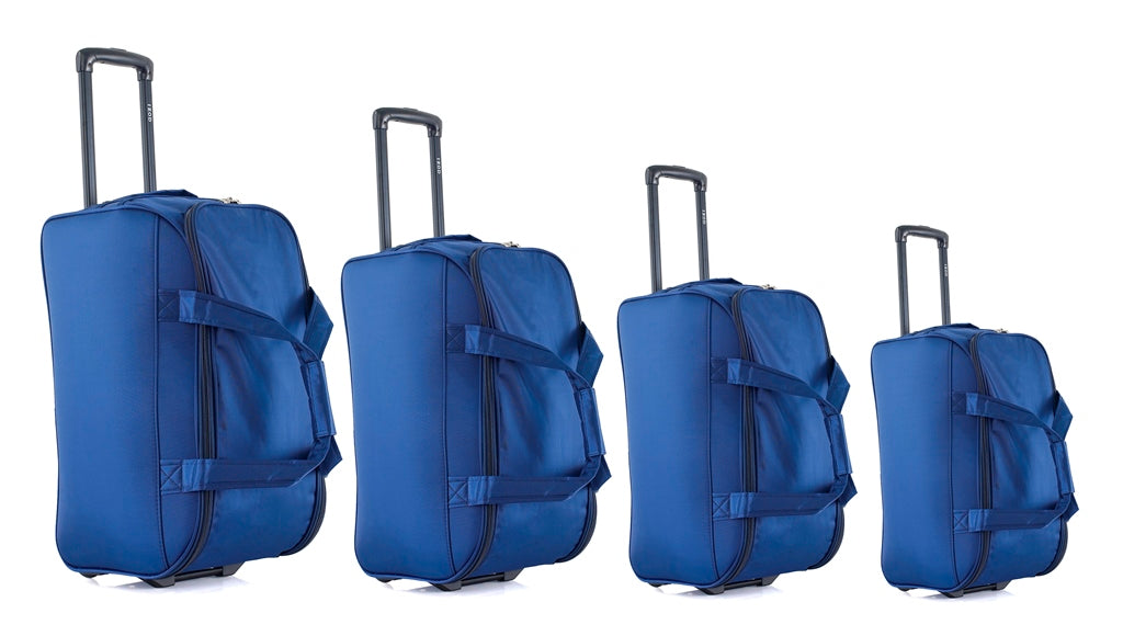 Four blue suitcases of different sizes on a white background
