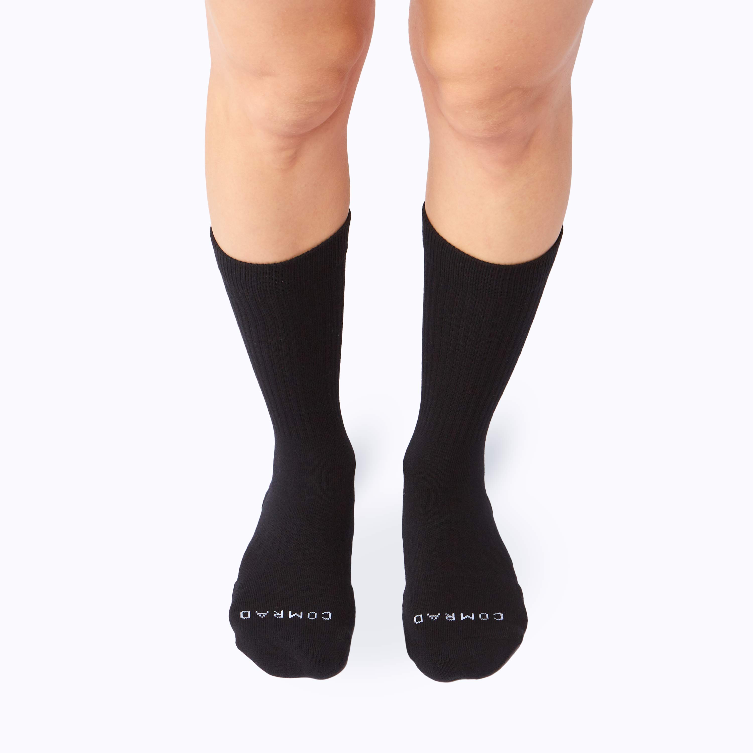 Black socks with a brand logo on a white background