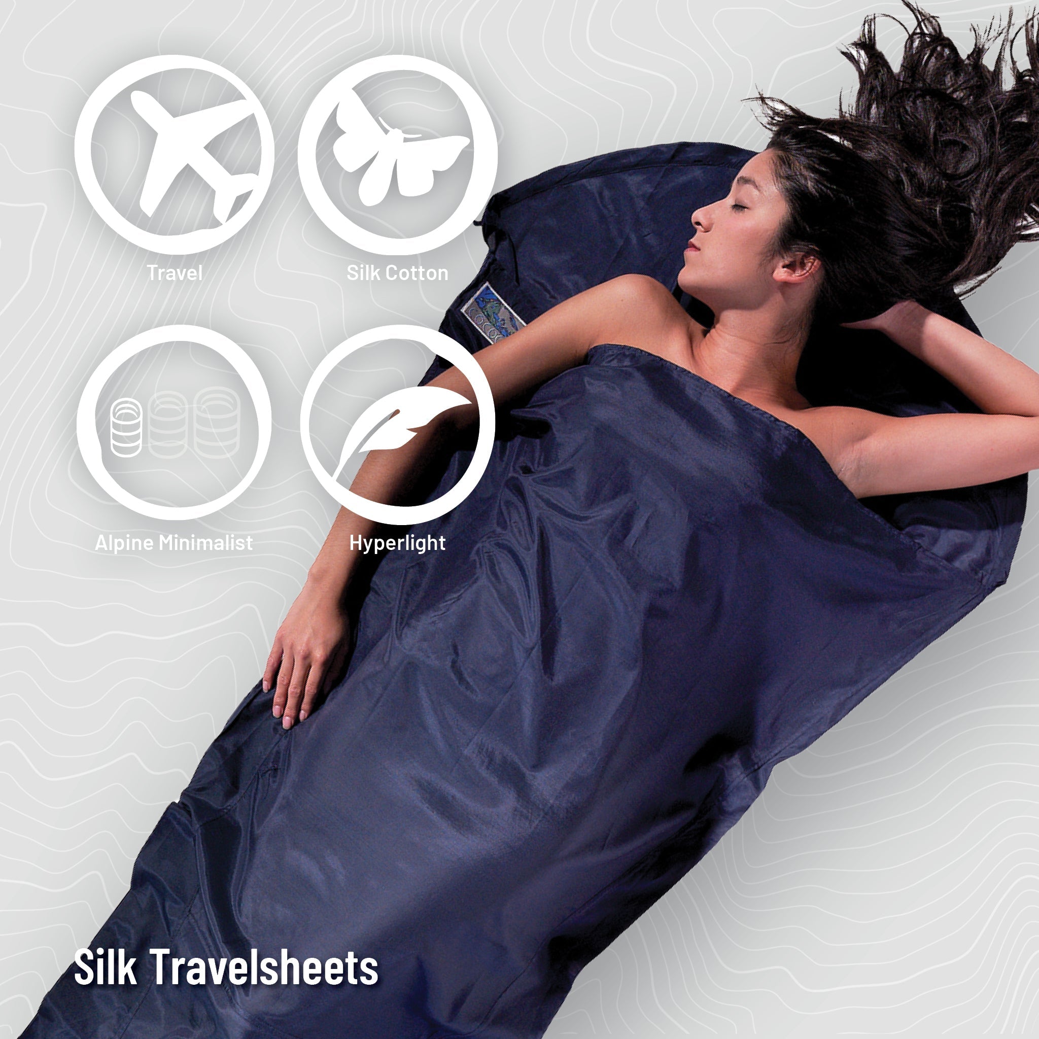 Person lying on a silk travelsheet with features highlighted on a light gray background