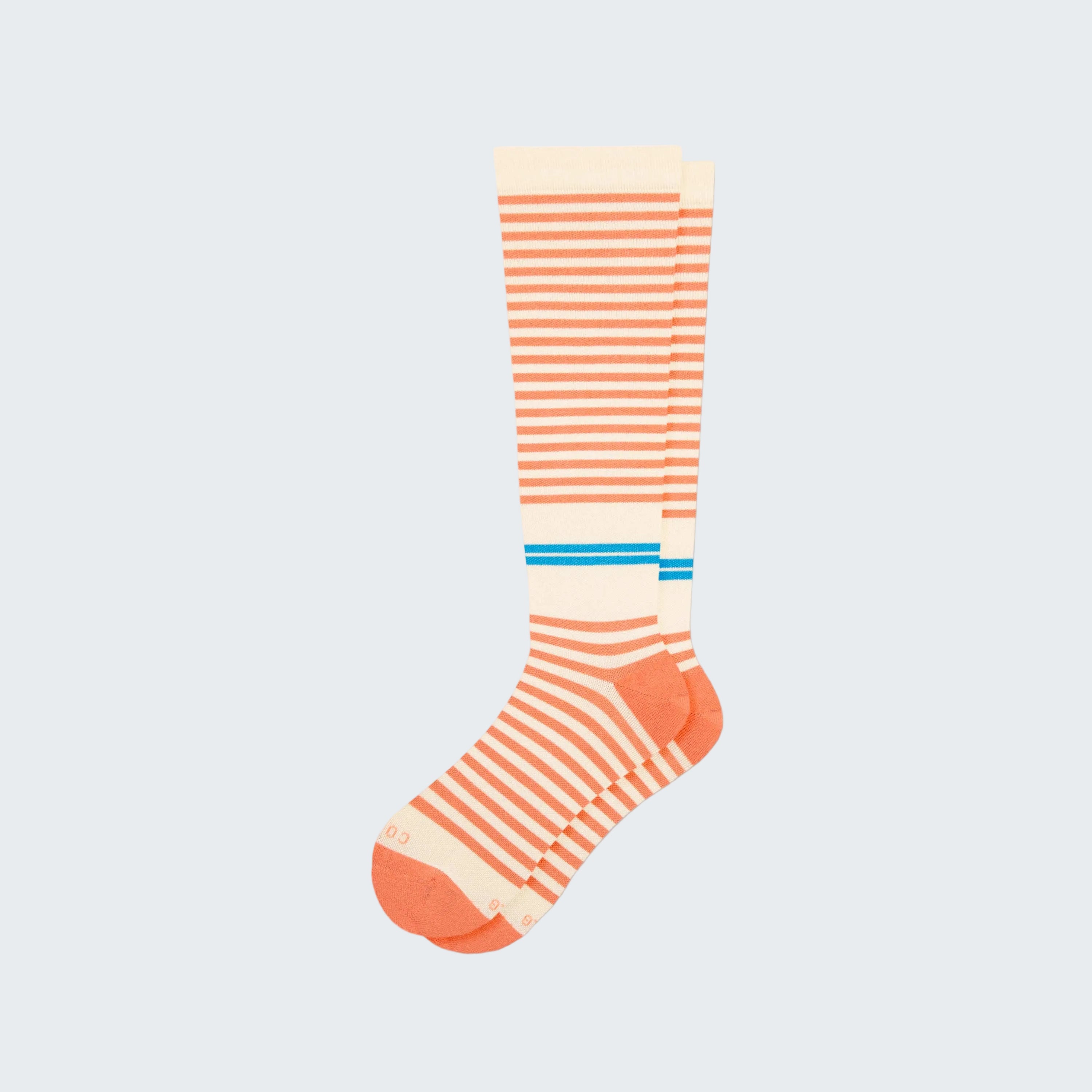 Striped sock with orange and white pattern on a white background