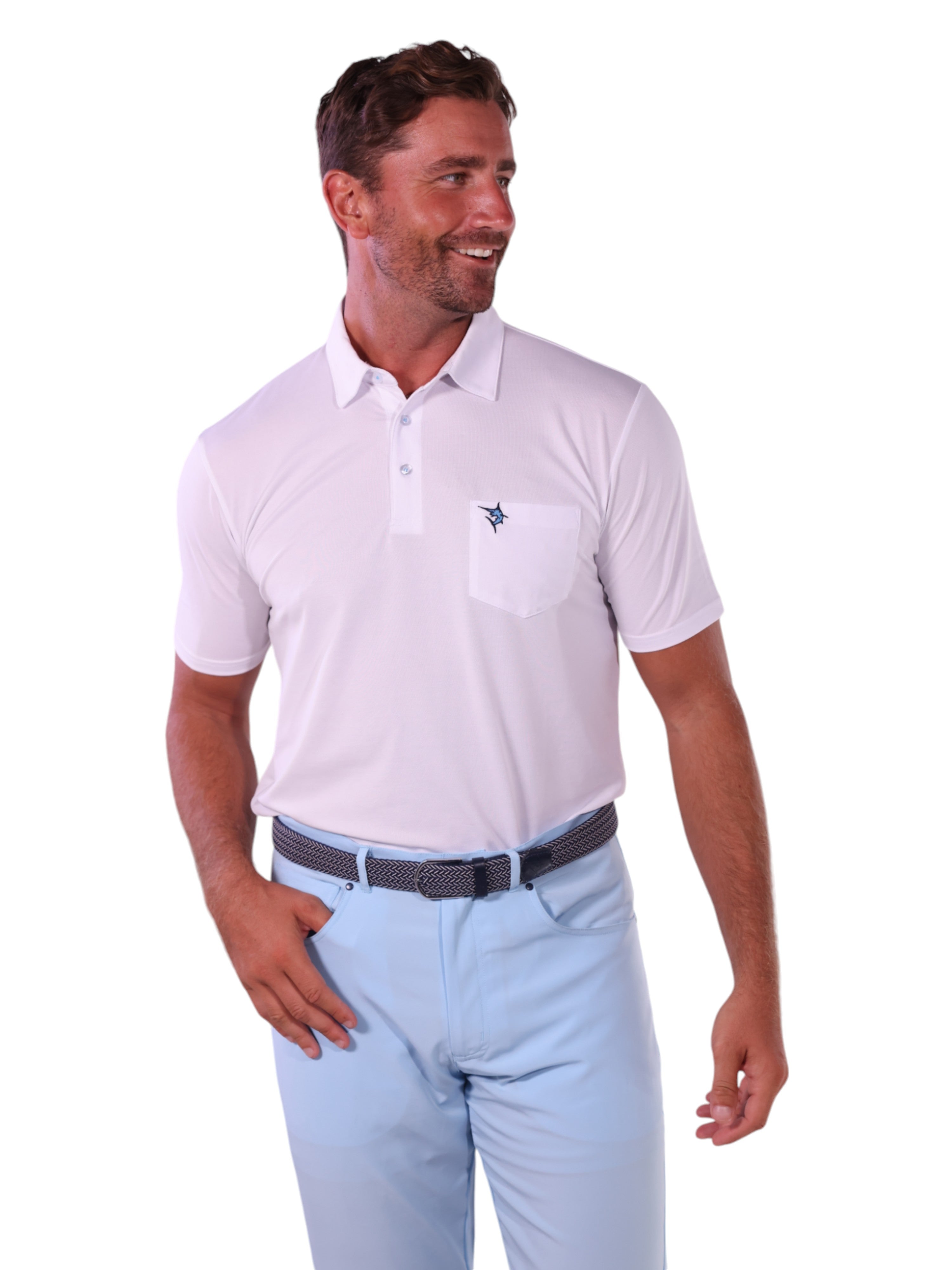 Man wearing a white polo shirt and light blue pants on a white background