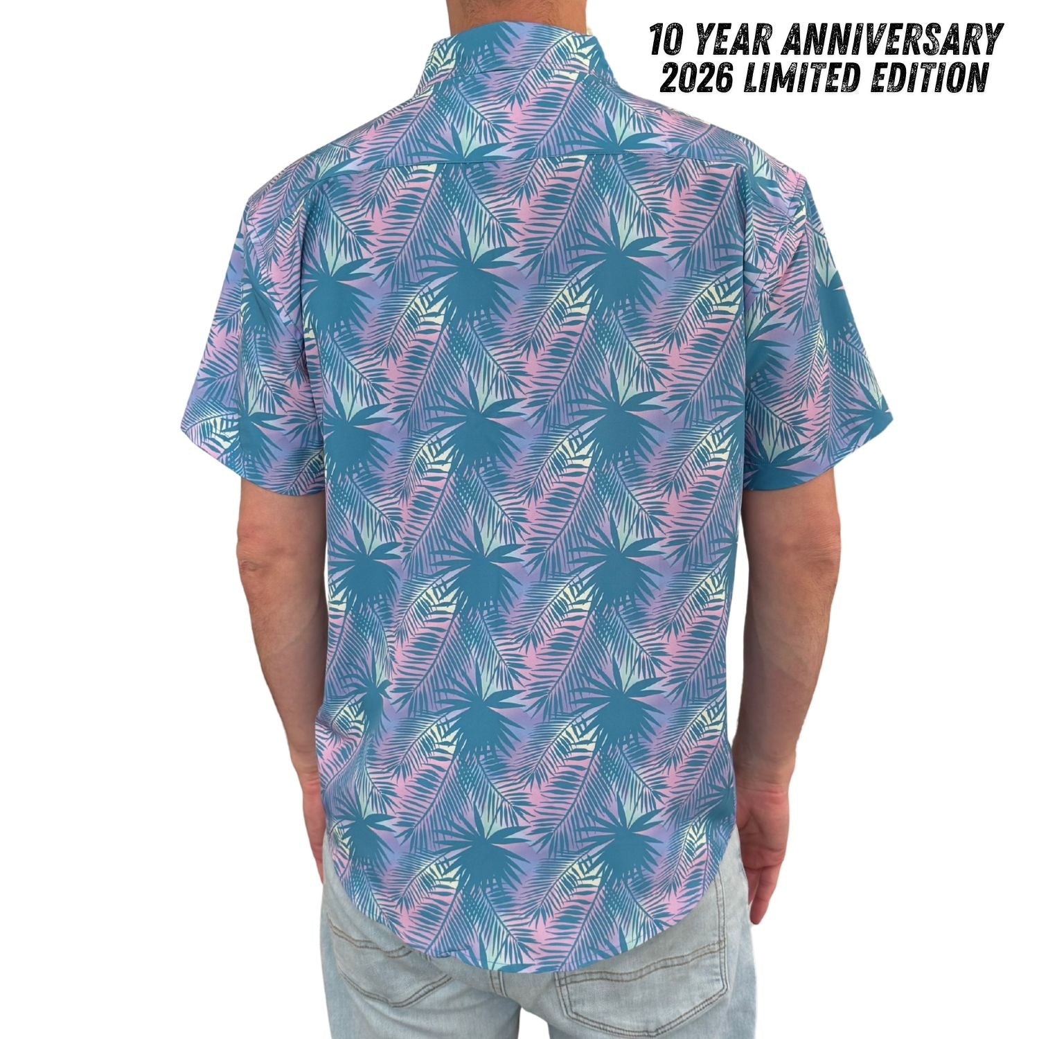 Person wearing a colorful patterned shirt with '10 Year Anniversary 2026 Limited Edition' text.