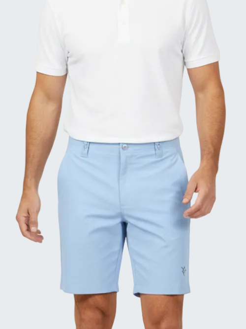 Person wearing light blue shorts and a white polo shirt on a white background
