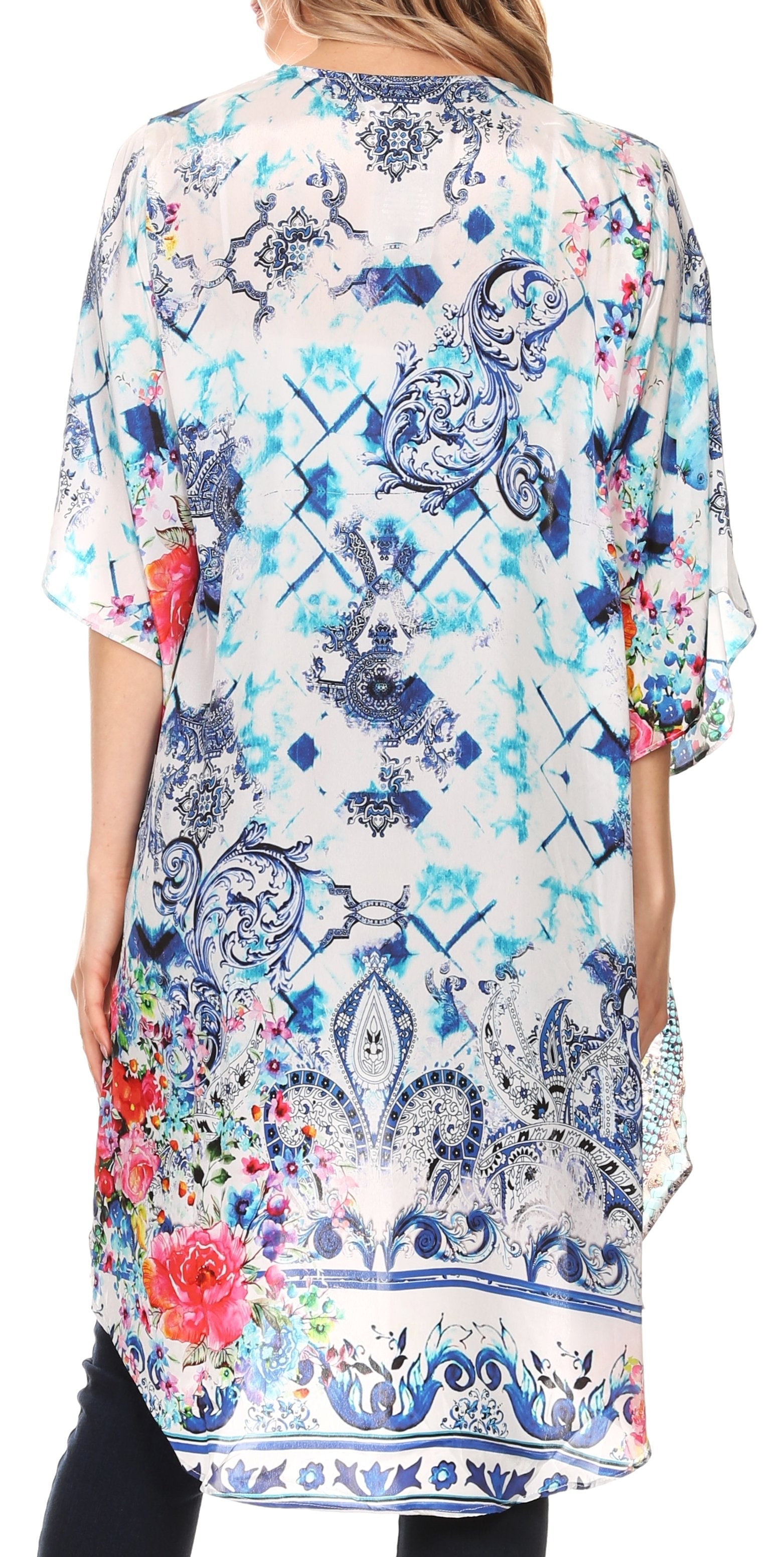 Colorful floral and abstract patterned shirt worn by a person