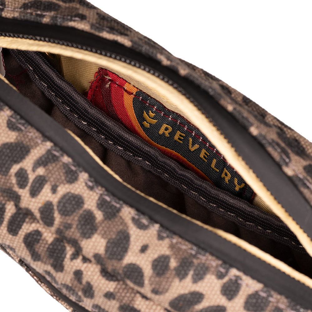 Leopard print pouch with 'Revelry' branding on a white background