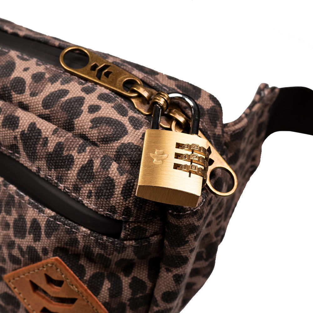 Leopard print bag with a gold padlock on a white background