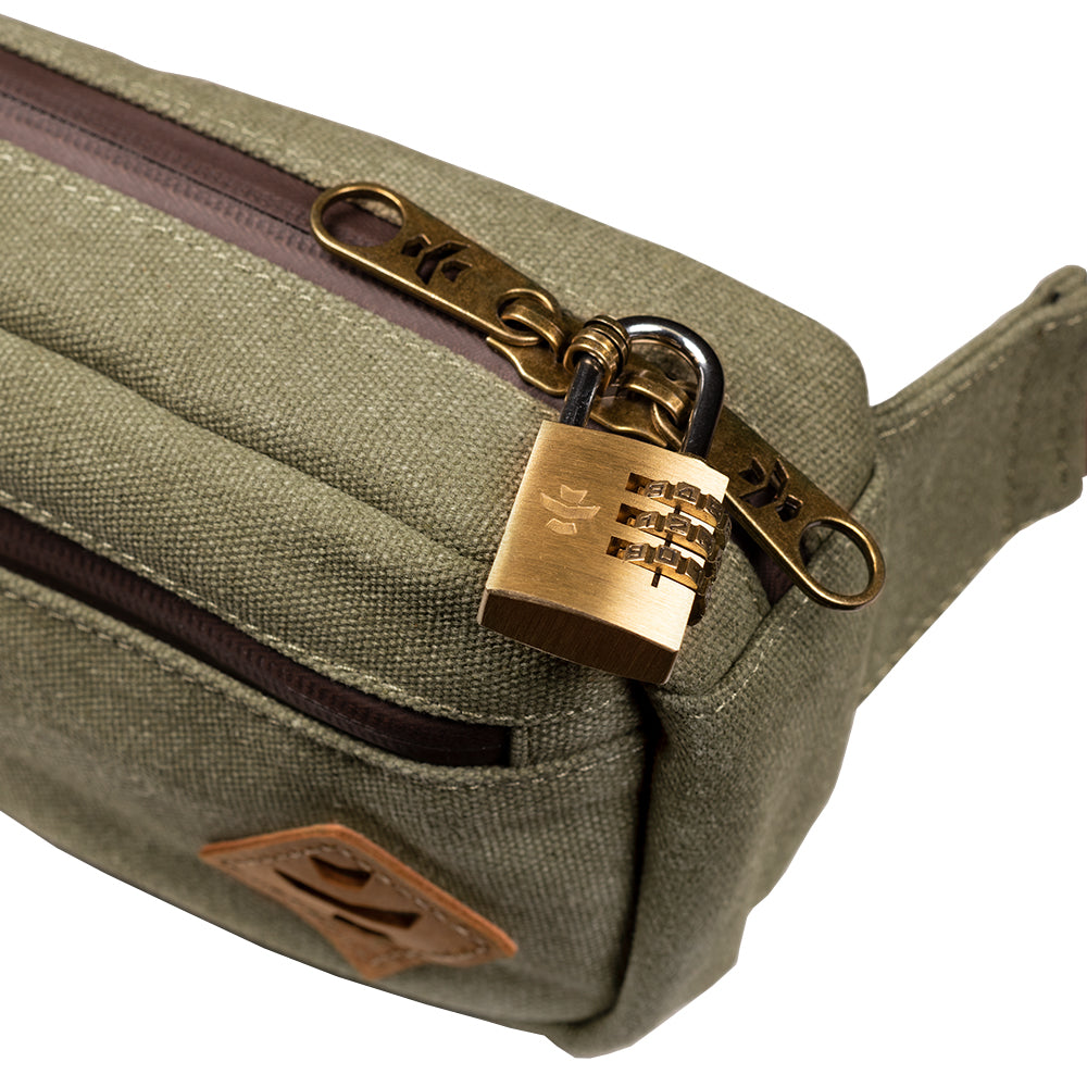 Green canvas bag with a gold padlock on a white background
