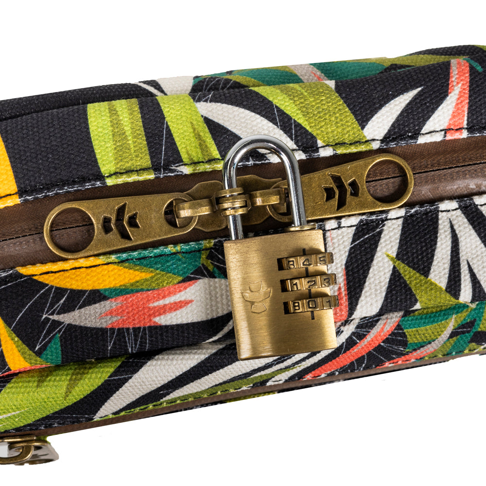 Colorful patterned bag with a gold lock on a white background