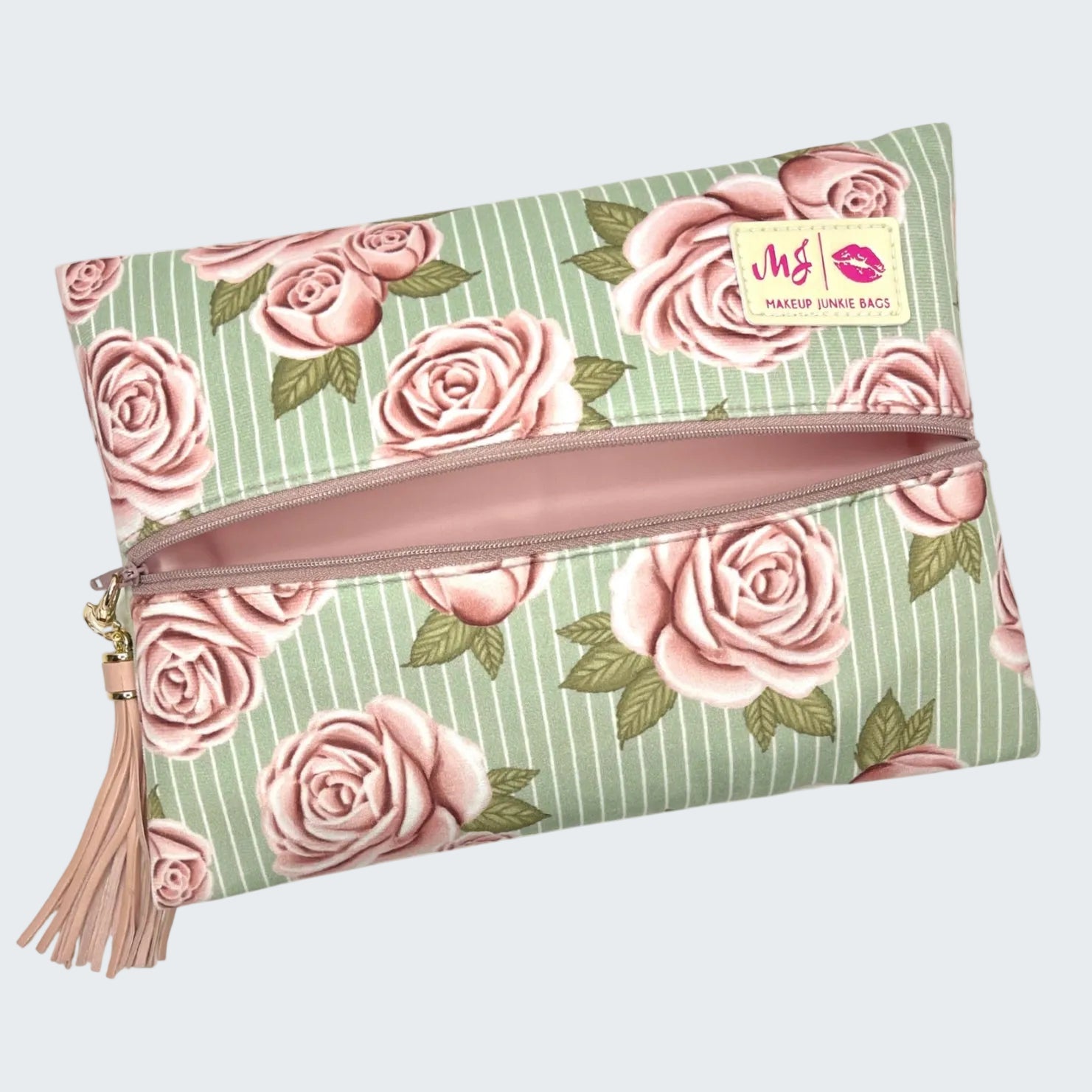 Floral patterned pouch with a zipper and tassel on a white background