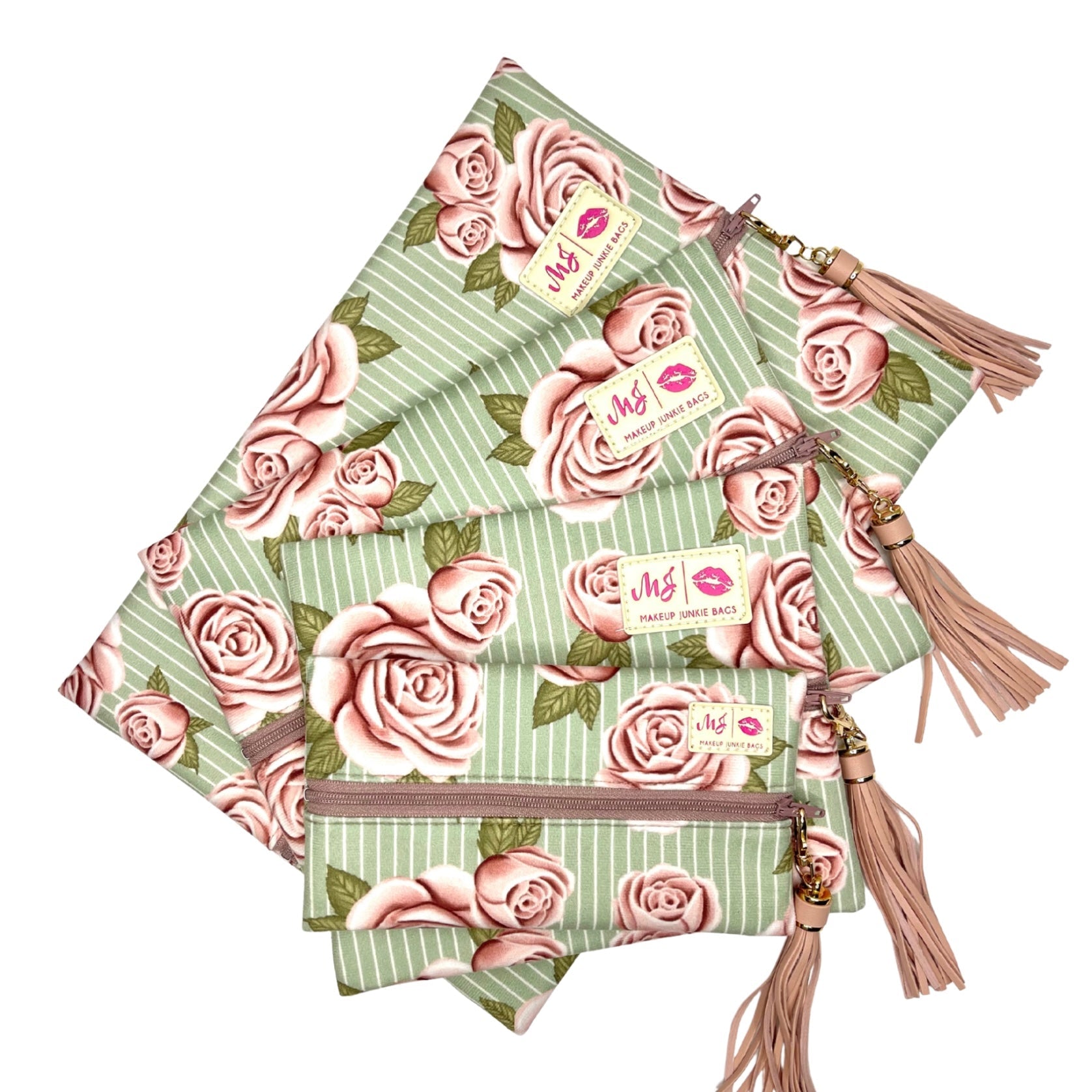 Floral patterned pouches with tassels on a white background