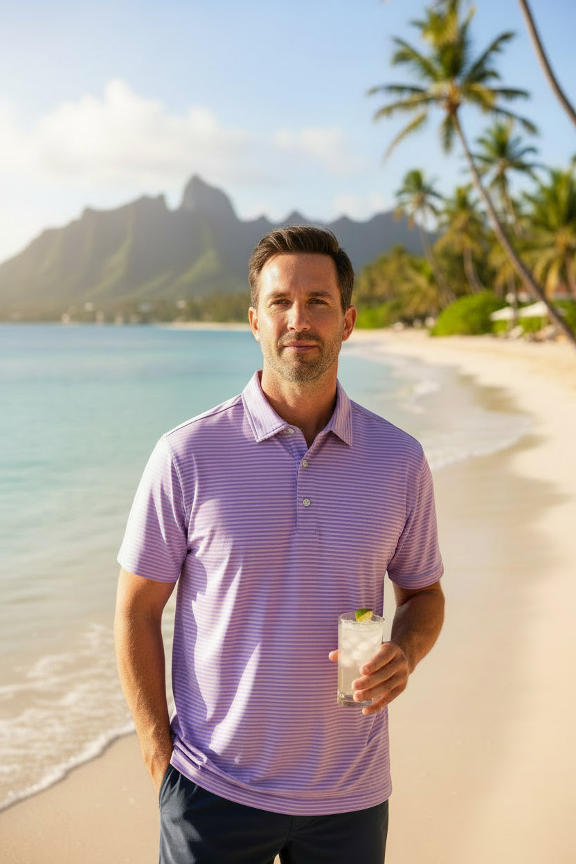 Blue and pink striped polo shirt with a brand logo on a white background