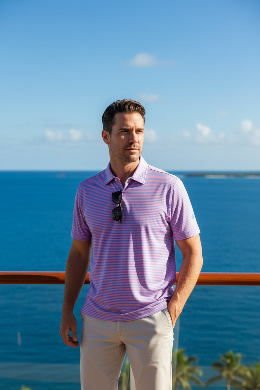 Blue and pink striped polo shirt with a brand logo on a white background