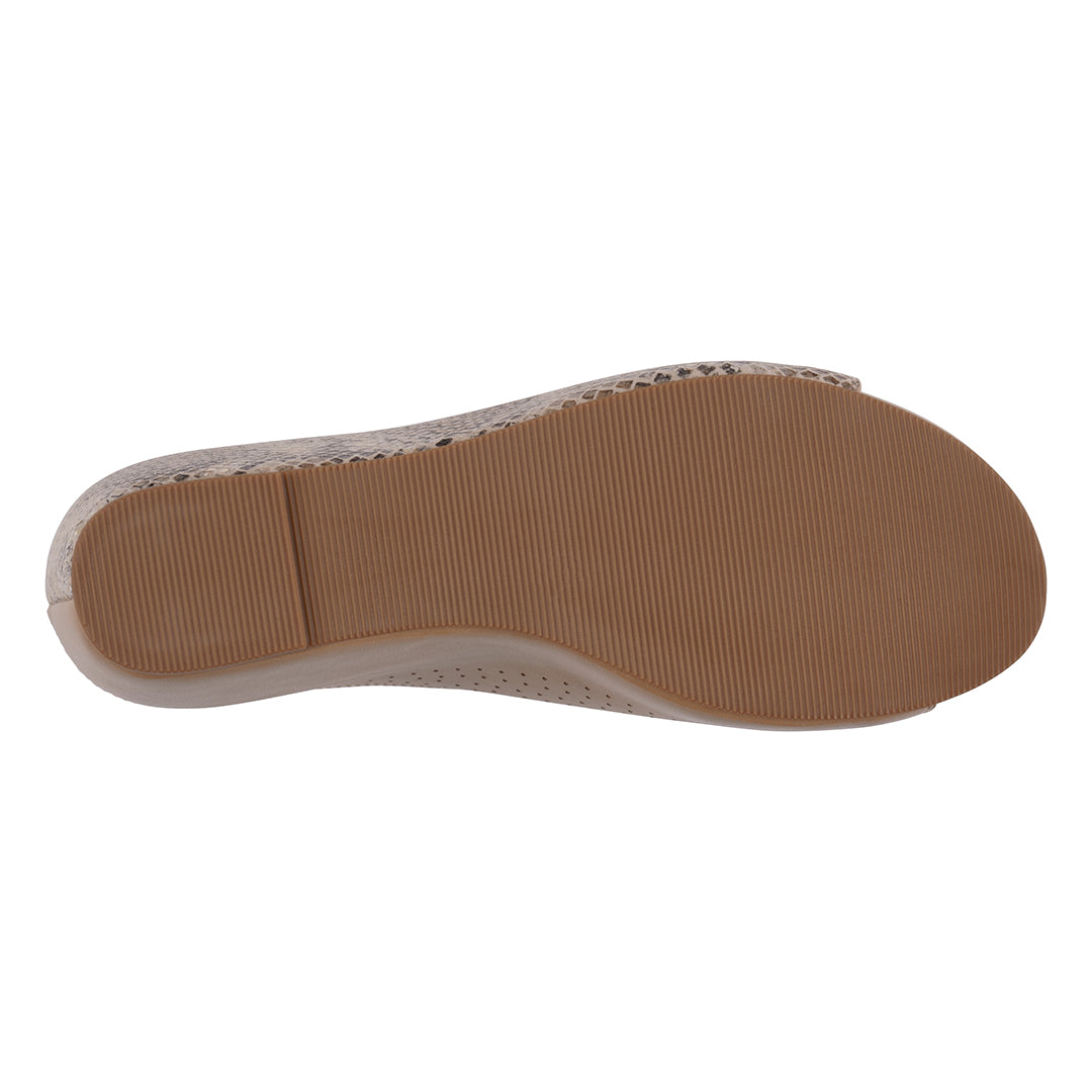 Brown sole of a shoe on a white background