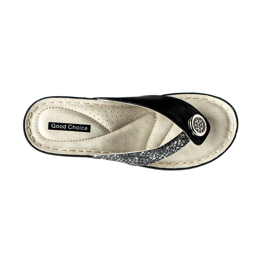 White sandal with black strap and 'Good Choice' label on a white background