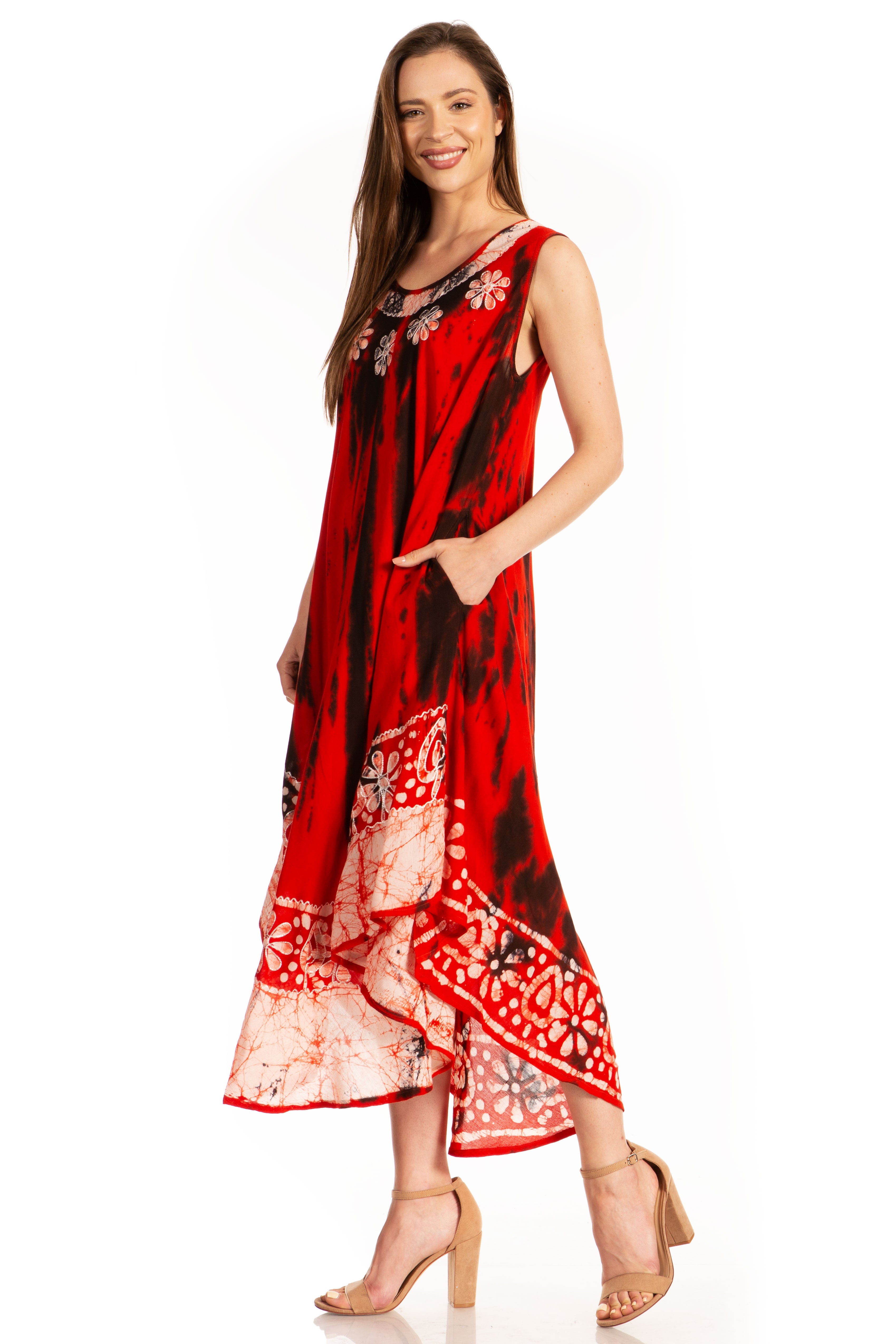 Woman wearing a red dress with floral patterns on a white background